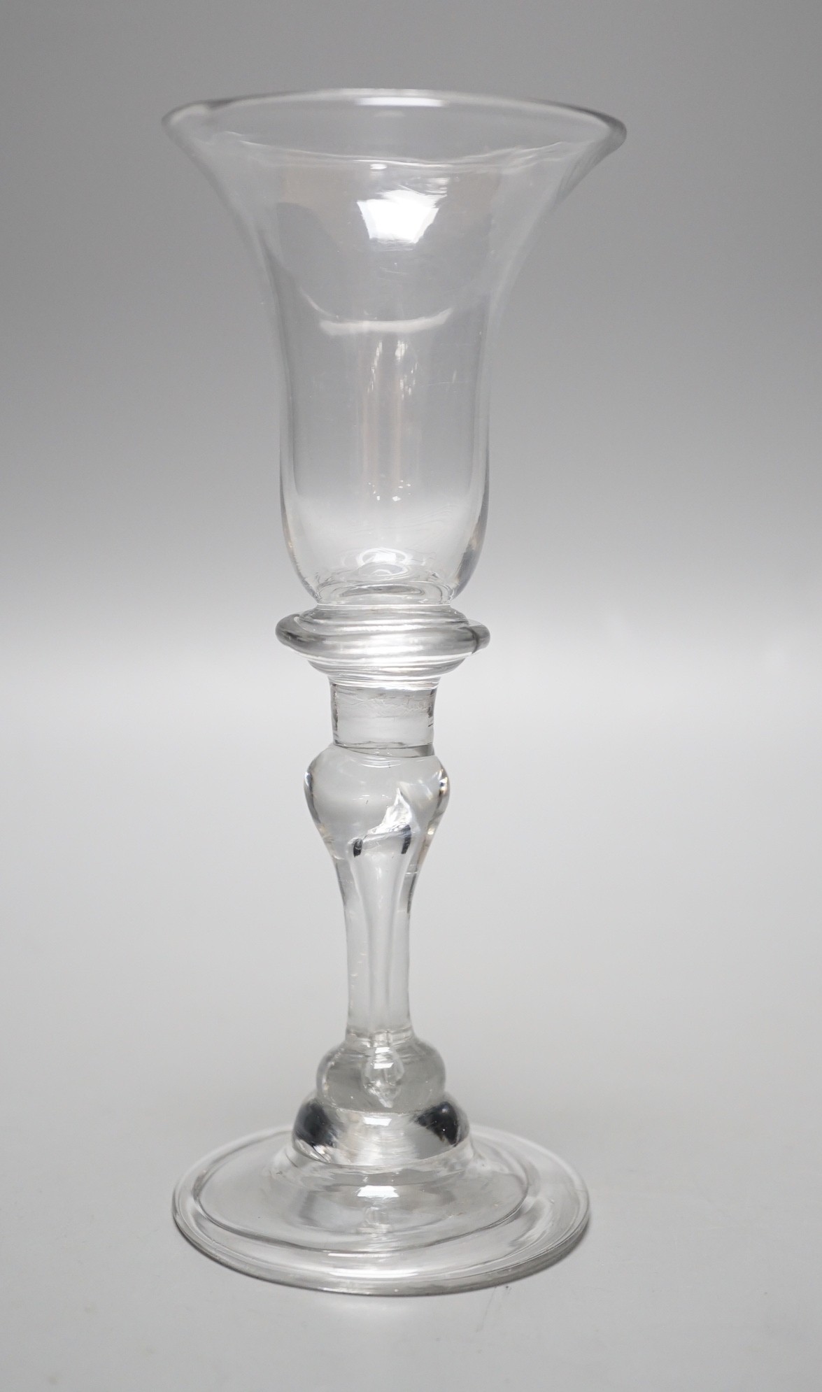 A George II wine glass with inverted teardrop baluster stem, 15.5cm tall